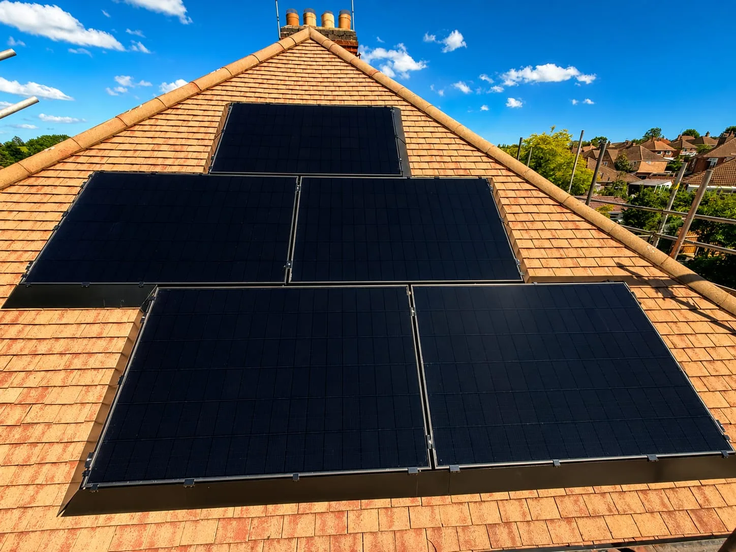 A roof of all-black solar panels installed by Apex Renewables